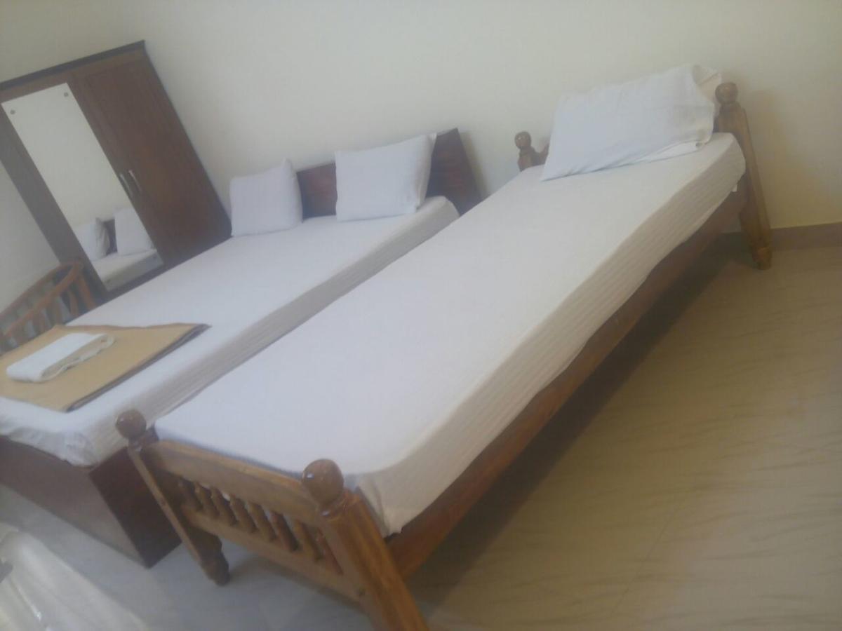 Guruvāyūr Manjira Lodge מראה חיצוני תמונה
